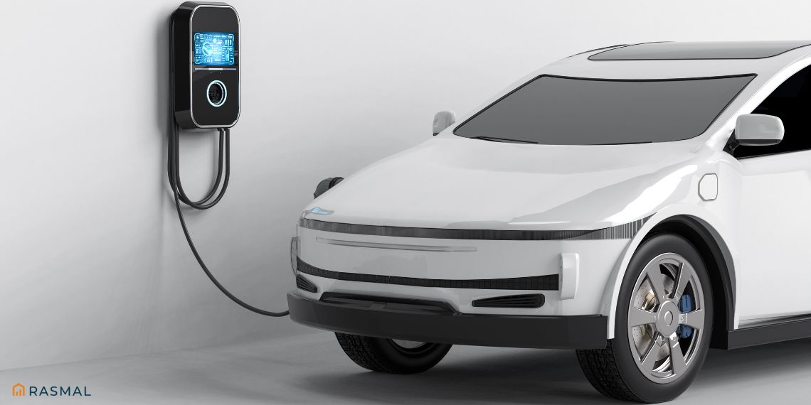 Electric car plugged into charger, showcasing Saudi-Egyptian Alliance for EV Production
