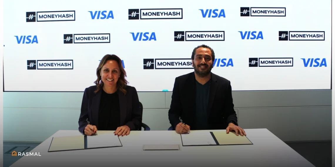 MoneyHash and Visa Team Member signing Contract