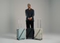 Armoir founder Martial Dahan with three premium luggage models after announcing $500K seed funding to expand in MENA and Europe.