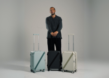 Armoir founder Martial Dahan with three premium luggage models after announcing $500K seed funding to expand in MENA and Europe.