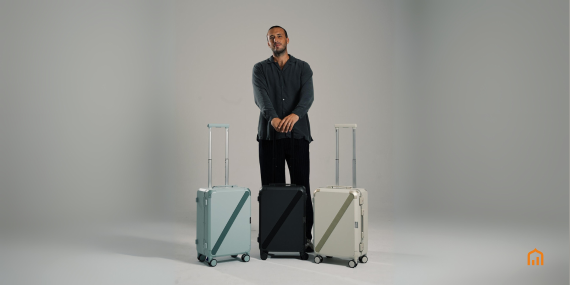 Armoir founder Martial Dahan with three premium luggage models after announcing $500K seed funding to expand in MENA and Europe.