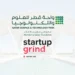 Logos of Qatar Science & Technology Park and Startup Grind Doha with QSTP campus in the background